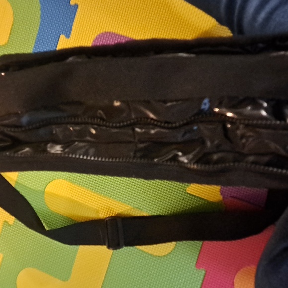 LeSportsac Deluxe Everyday Bag in a black shine or patent finish. - Picture 7 of 13